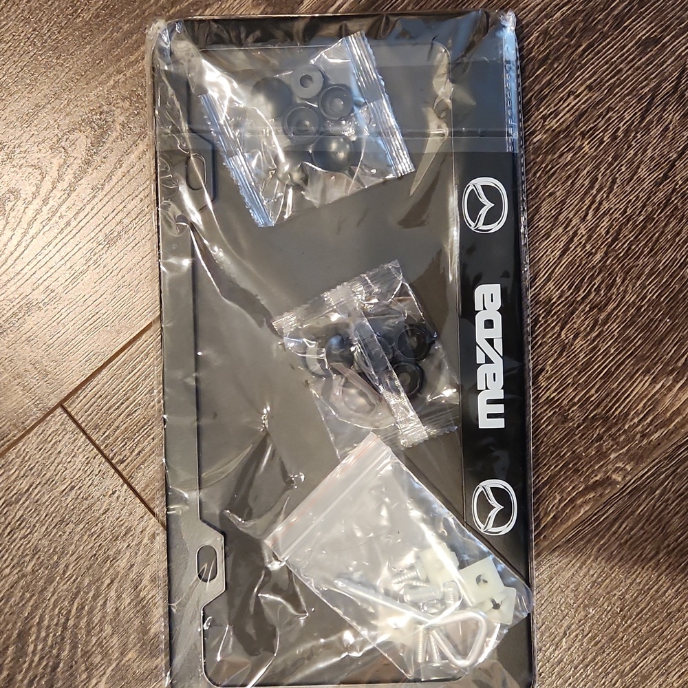 Mazda Black License Plate Frame and Screw Caps - Brand New Steel